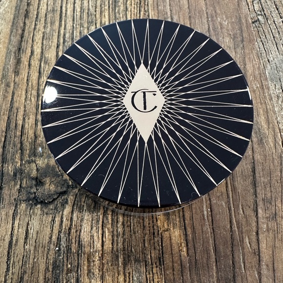 Charlotte Tilbury Magic Powder - Deep Brown Lid with Pale Pink Text - Picture 2 of 4